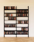 DVD media storage shelving unit with black shelves and black vertical posts, two bays, 31-inch shelf width, shown with open media storage shelf levels.
