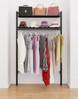 Closet storage system with black shelves and black vertical posts, plus hanger bars, shown with open shelving.