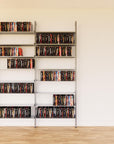DVD media storage shelving unit with satin shelves and satin vertical posts, two bays, 31-inch shelf width, shown with open media storage shelf levels.