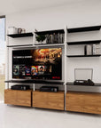 Modern wall-mounted media shelving unit with adjustable shelves and sleek minimalist design – contemporary storage solution for home and office.