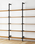 Wood shelf modular shelving unit, shown with open shelf levels.