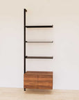 Retail display shelving unit with wood-tone SOI finish shelves, black vertical posts, and base cabinets in a 31-inch configuration, shown with open display shelving.