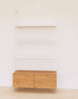 Retail display shelving unit with Tea for Two shelves, white vertical posts, and base cabinets in a 48-inch configuration, shown with open display shelving.