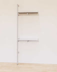 Retail display shelving extension with satin shelves and satin vertical post, shown with front hanging bars and display shelves in a 31-inch, one-bay configuration.