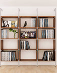 Modular vinyl storage shelving unit with wood-look shelves and satin vertical posts, two bays, shown with open record storage shelf levels.