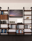 Four-bay media center shelving unit with wood-look shelves and black vertical posts, four bays, shown with open shelf levels.
