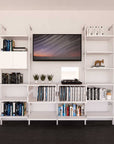 Four-bay media center shelving unit with white shelves and white vertical posts, four bays, shown with open shelf levels.