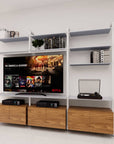 Modular media shelving unit, shown with open shelf levels.