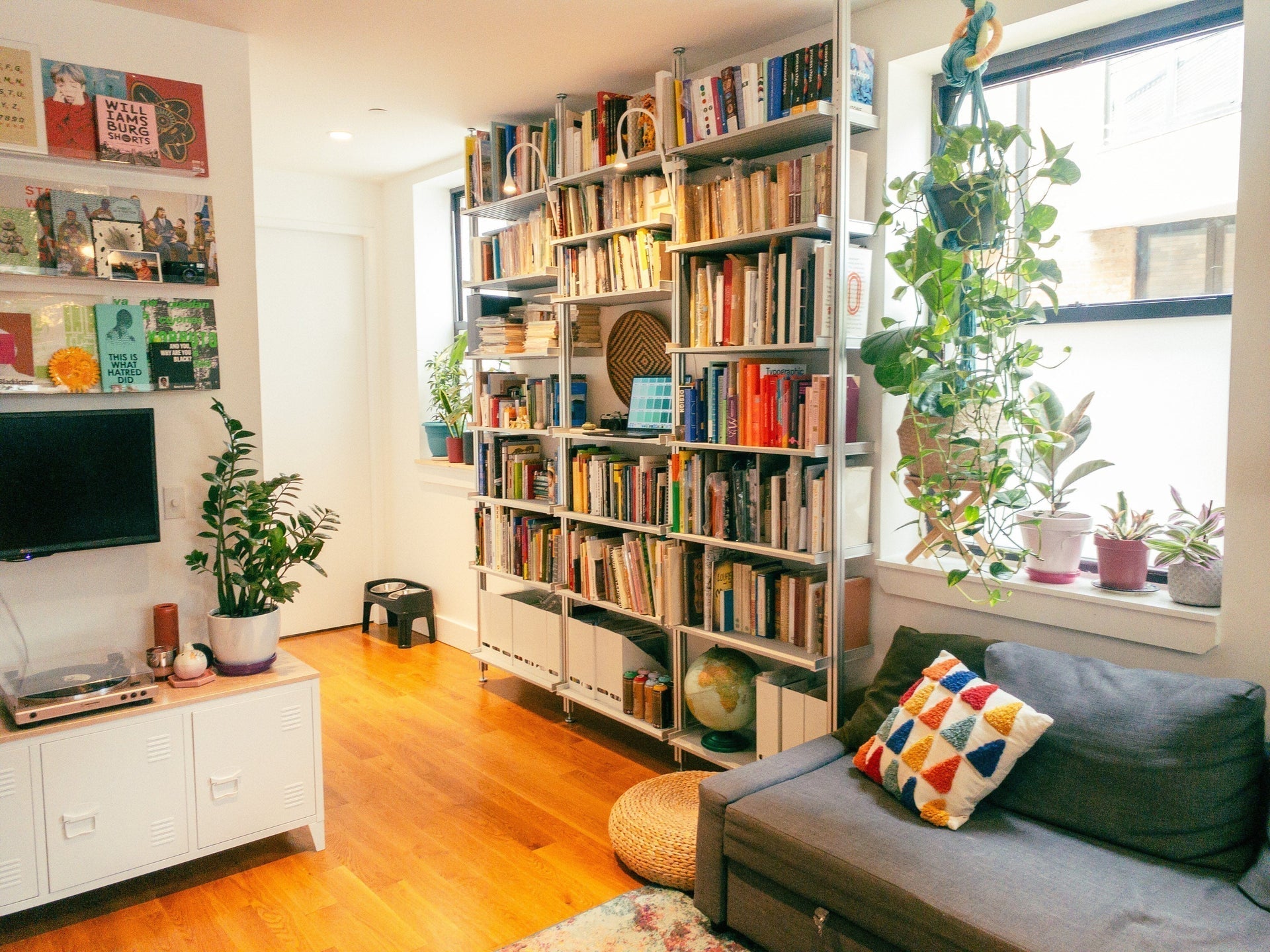 Modern Shelving Triples Storage Space for NYC Book Designer