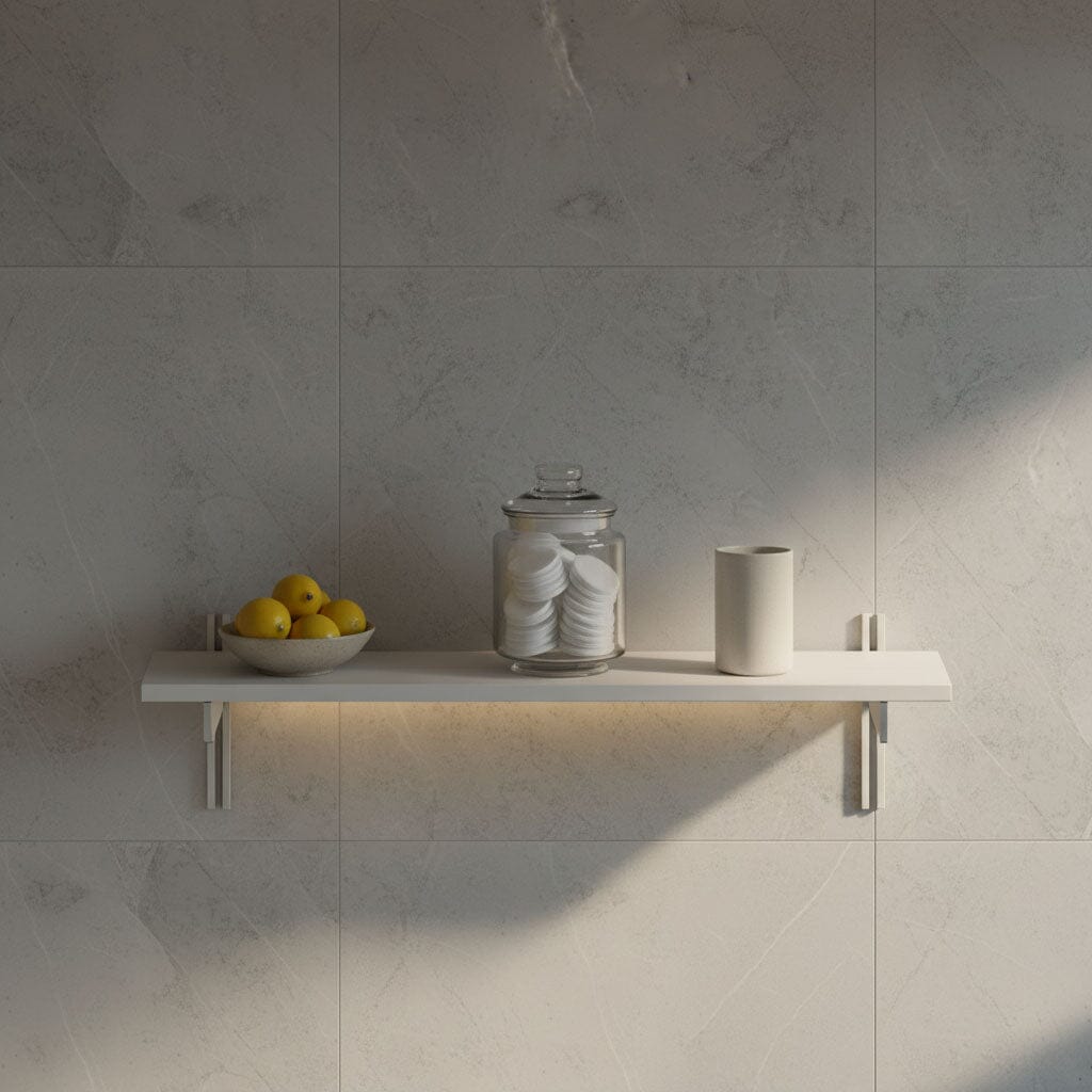 M-Float 12-inch-deep floating aluminum shelf with LED channel in satin finish, shown as a single display shelf.