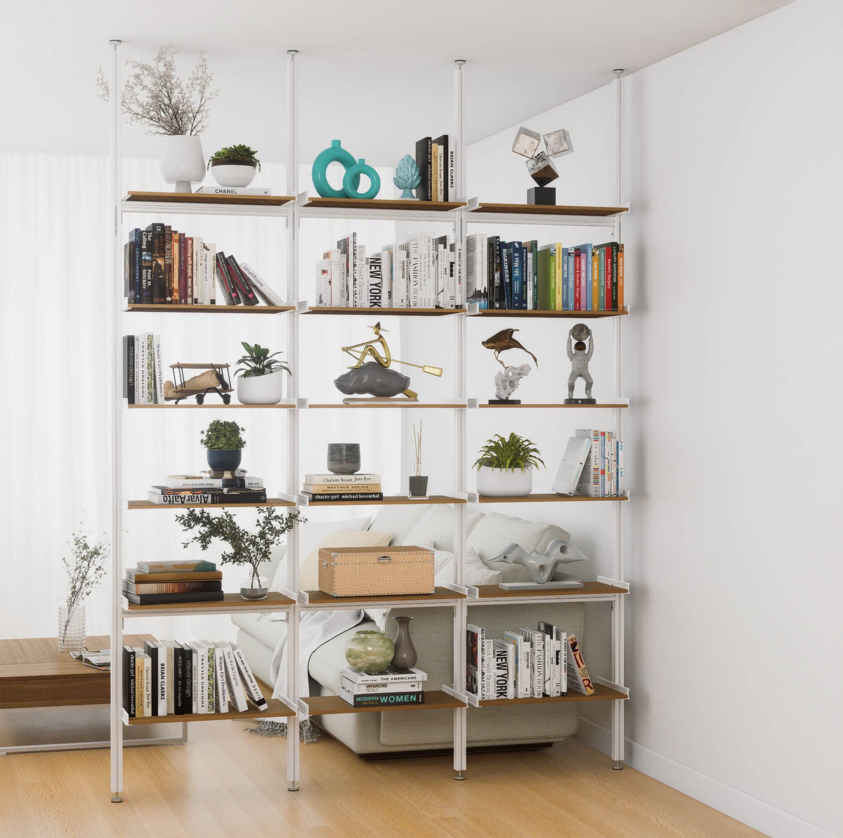Aluminaire floor-to-ceiling room divider shelving unit with wood-look aluminum shelves, white vertical posts, three bays, 24-inch bay width, and six open shelf levels.