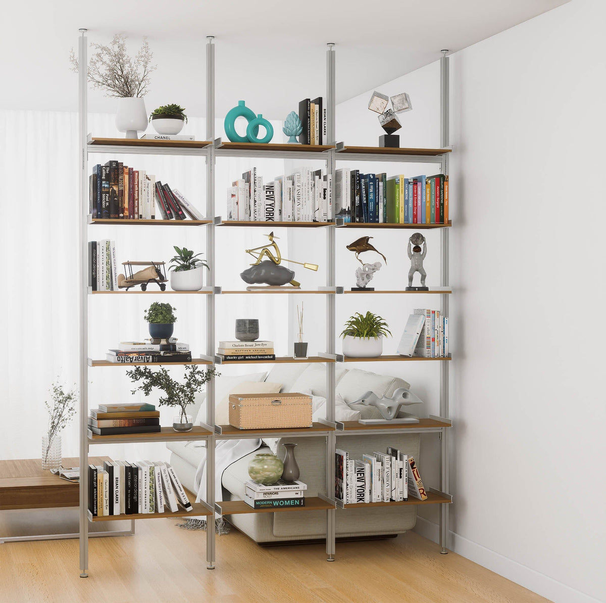 Aluminaire floor-to-ceiling room divider shelving unit with wood-look aluminum shelves, satin vertical posts, three bays, 24-inch bay width, and six open shelf levels.