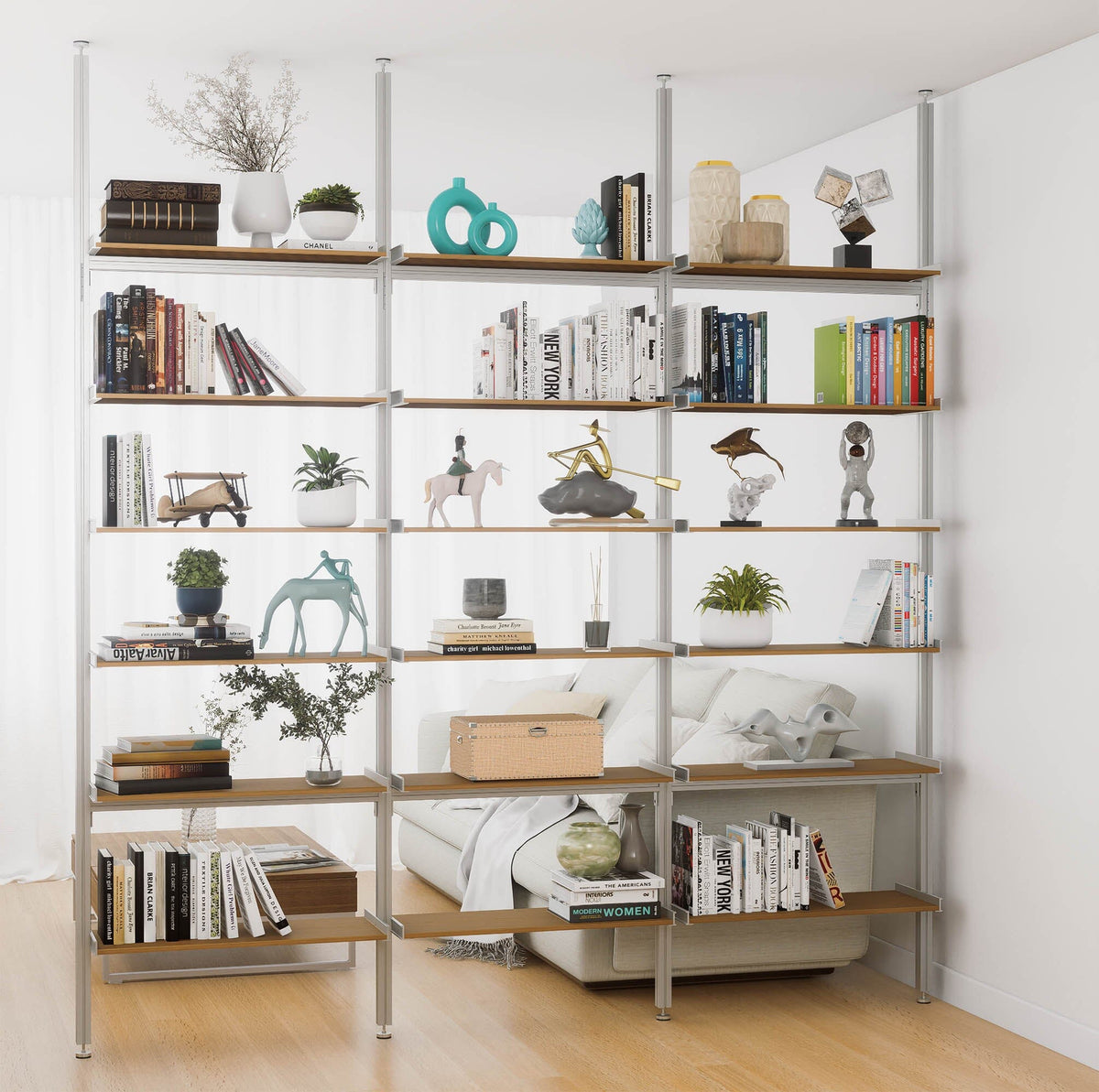 Aluminaire floor-to-ceiling room divider shelving unit with wood-look aluminum shelves, satin vertical posts, three bays, 31-inch bay width, and six open shelf levels.