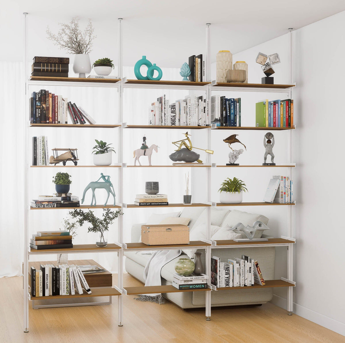 Aluminaire floor-to-ceiling room divider shelving unit with wood-look aluminum shelves, white vertical posts, three bays, 31-inch bay width, and six open shelf levels.