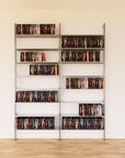 DVD media storage shelving unit with satin shelves and satin vertical posts, two bays, 31-inch shelf width, shown with open media storage shelf levels.