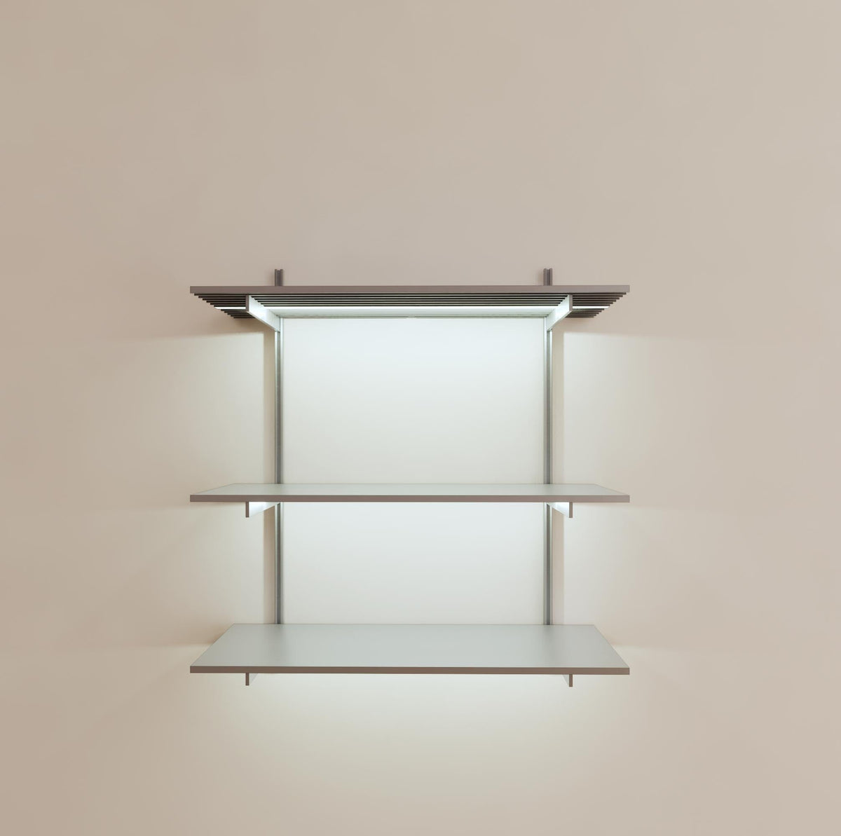 Modular shelving unit with satin shelves, satin vertical posts, and one bay, shown with three open shelf levels.