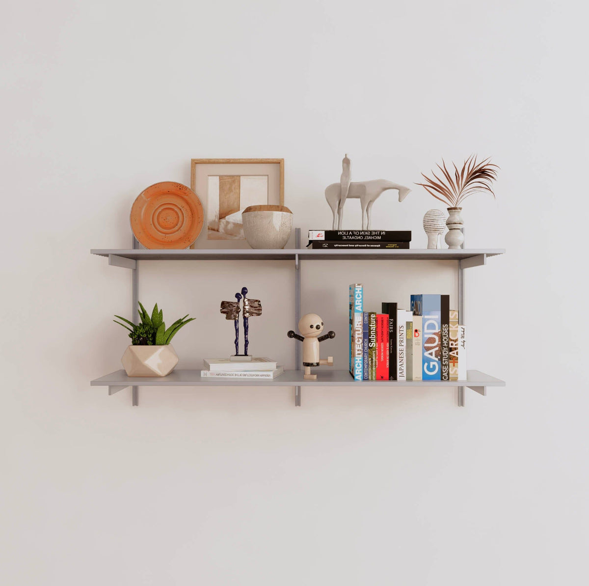 Modular shelving unit with satin shelves, satin vertical posts, and one bay, shown with two open shelf levels.