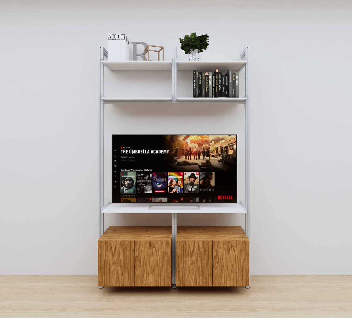 Modular media shelving unit with white shelves and satin vertical posts, with Tea for Two wood cabinet storage, two bays, shown with open shelf levels.