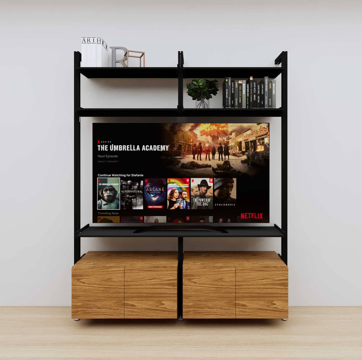 Modular media shelving extension with black shelves and black vertical post, with Tea for Two wood cabinet storage, shown with open shelf levels.