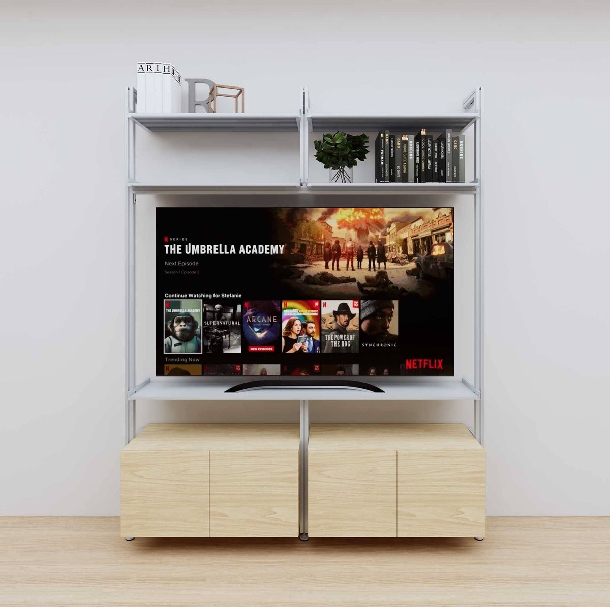 Modular media shelving unit with satin shelves and satin vertical posts, with Casting Light wood cabinet storage, two bays, shown with open shelf levels.