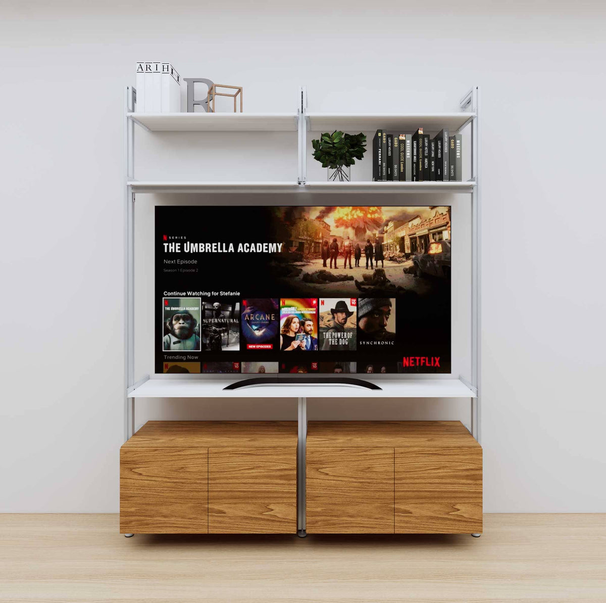 Modular media shelving unit with white shelves and satin vertical posts, with Tea for Two wood cabinet storage, two bays, shown with open shelf levels.
