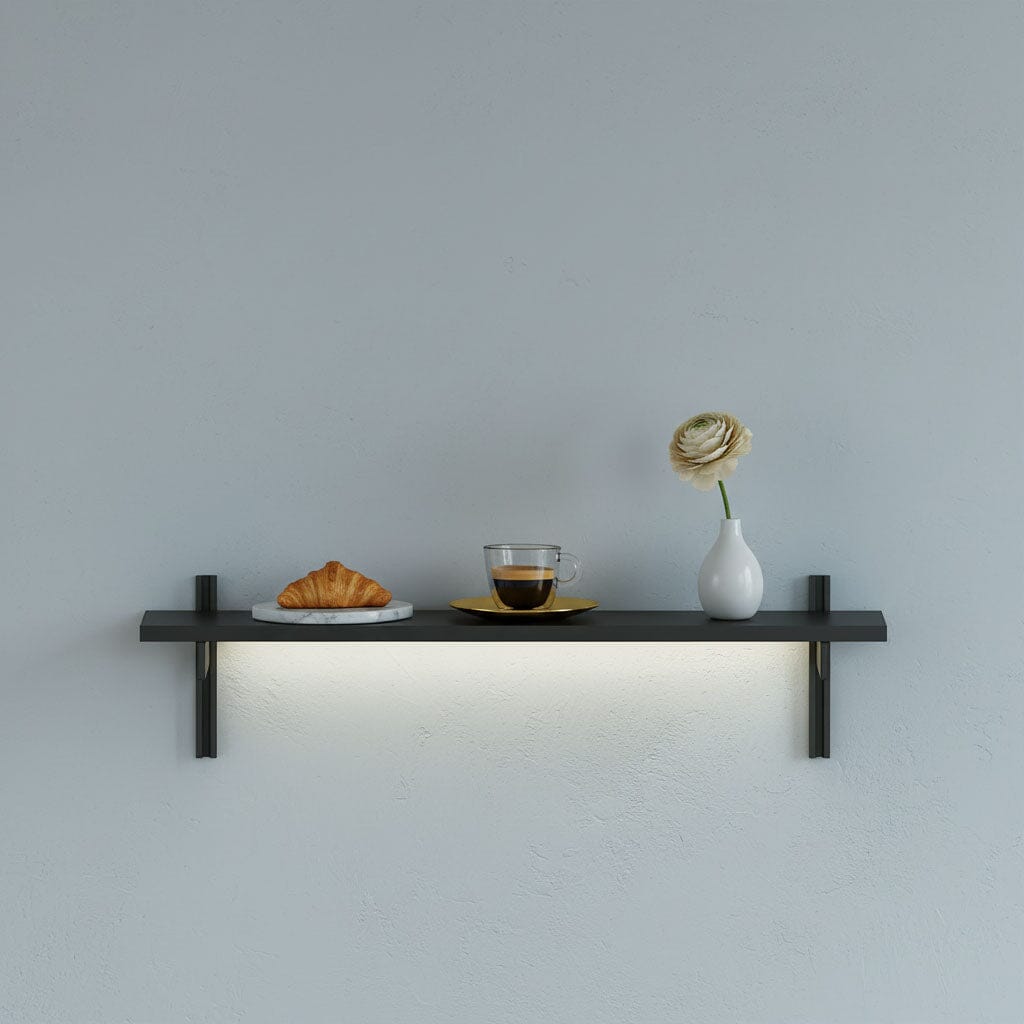 M-Float 6-inch-deep floating aluminum shelf with LED channel in black finish, shown as a single display shelf.
