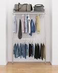 Closet storage system with satin shelves and satin vertical posts, plus hanger bars, shown with open shelving and one open shelf level.
