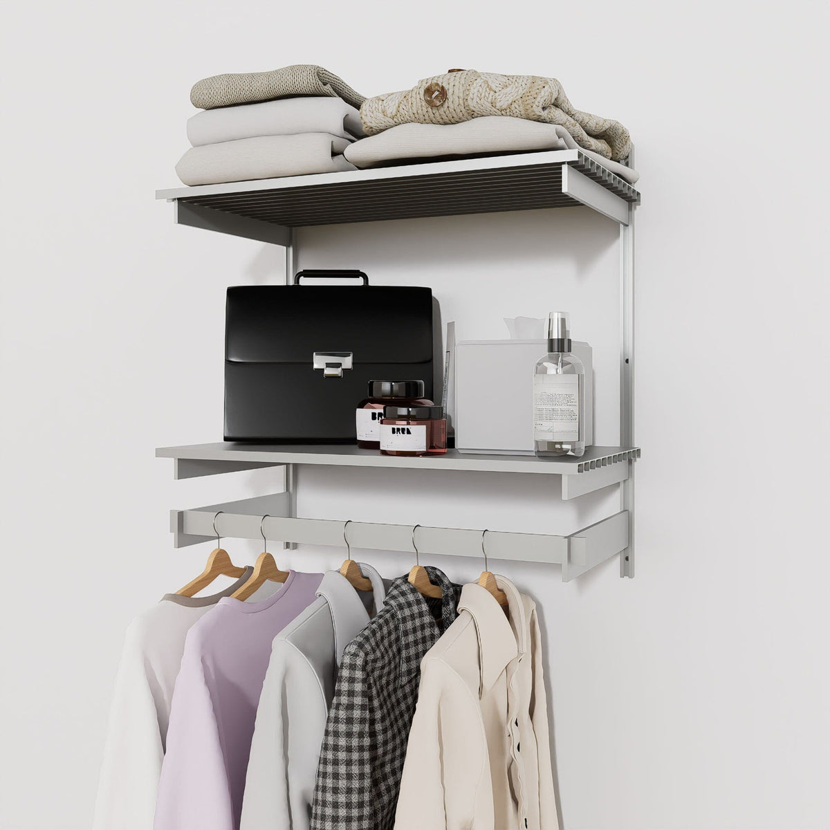 Closet storage system with satin shelves and satin vertical posts, plus hanger bars, shown with open shelving.
