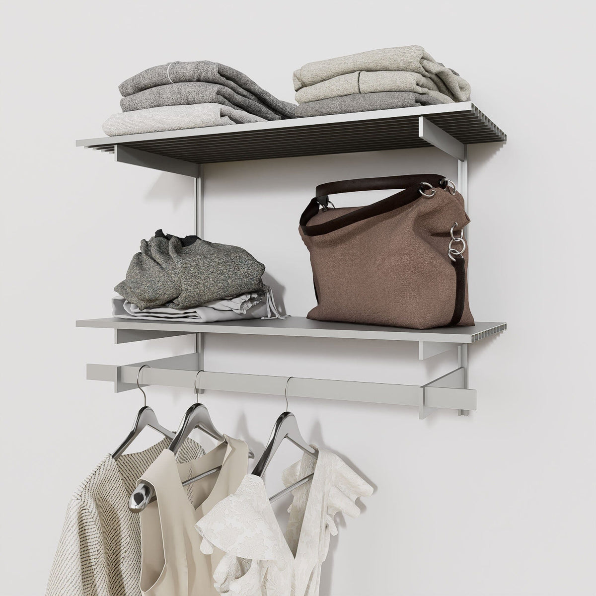 Closet storage system with satin shelves and satin vertical posts, plus hanger bars, shown with open shelving.
