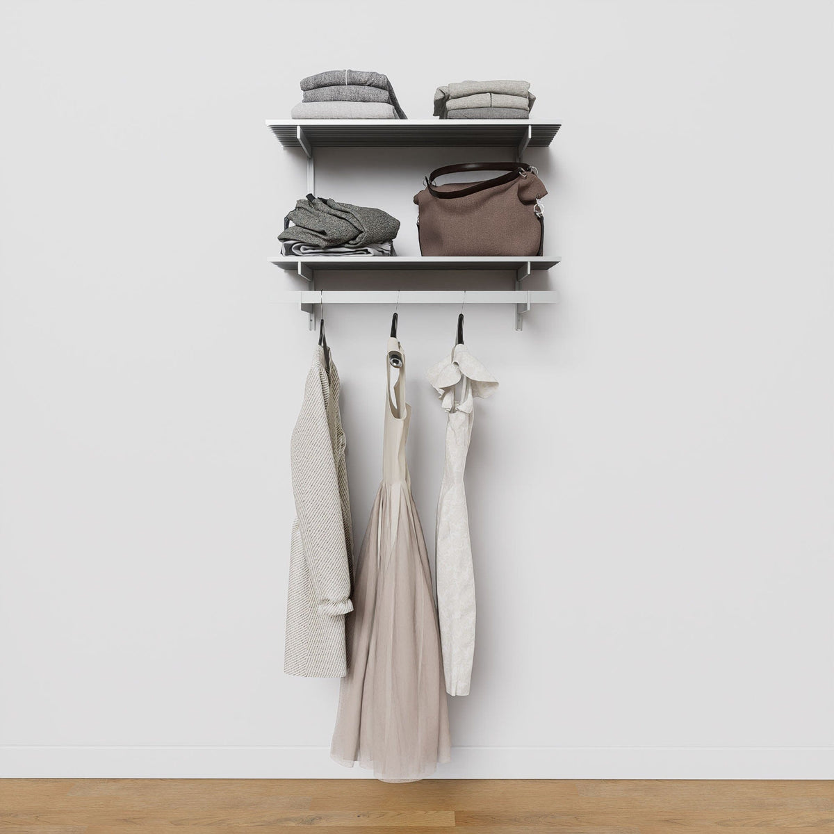 Closet storage system with satin shelves and satin vertical posts, plus hanger bars, shown with open shelving.