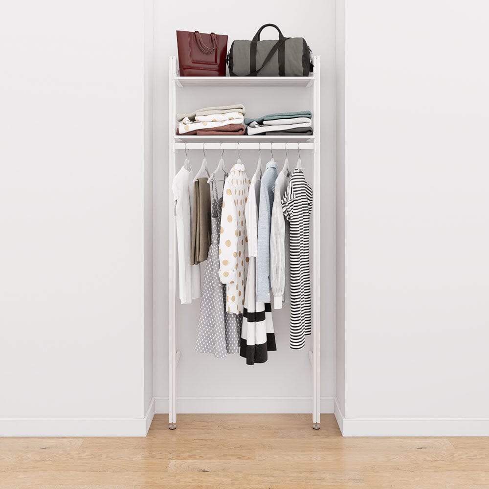 Closet storage system with white shelves and white vertical posts, plus hanger bars, shown with open shelving.