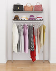 Closet storage system with satin shelves and satin vertical posts, plus hanger bars, shown with open shelving.