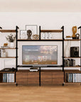 Harmony four-bay media unit with white shelves and satin vertical posts, four bays, styled as an entertainment storage unit.
