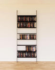 DVD media storage shelving unit with black shelves and satin vertical posts, one bay, shown with open media storage shelf levels.