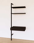 Desk shelving extension with black shelves and black vertical post, shown with desk surface and open shelf levels.