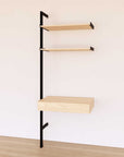 Desk shelving extension with Casting Light shelves and black vertical post, shown with desk surface and open shelf levels.