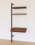 Desk shelving extension with wood-look shelves and black vertical post, shown with desk surface and open shelf levels.