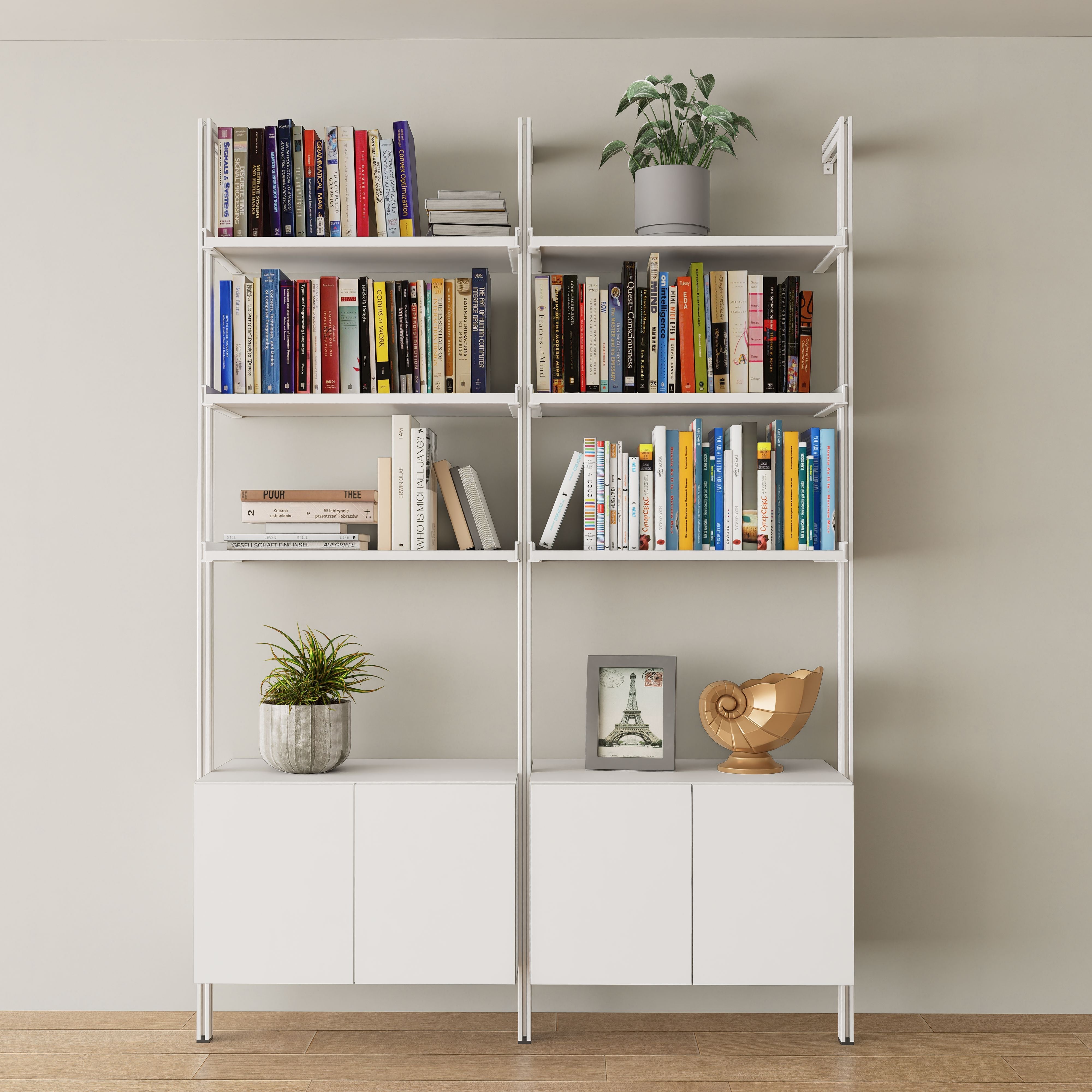 Contemporary all-white two-bay home bookshelf storage unit.