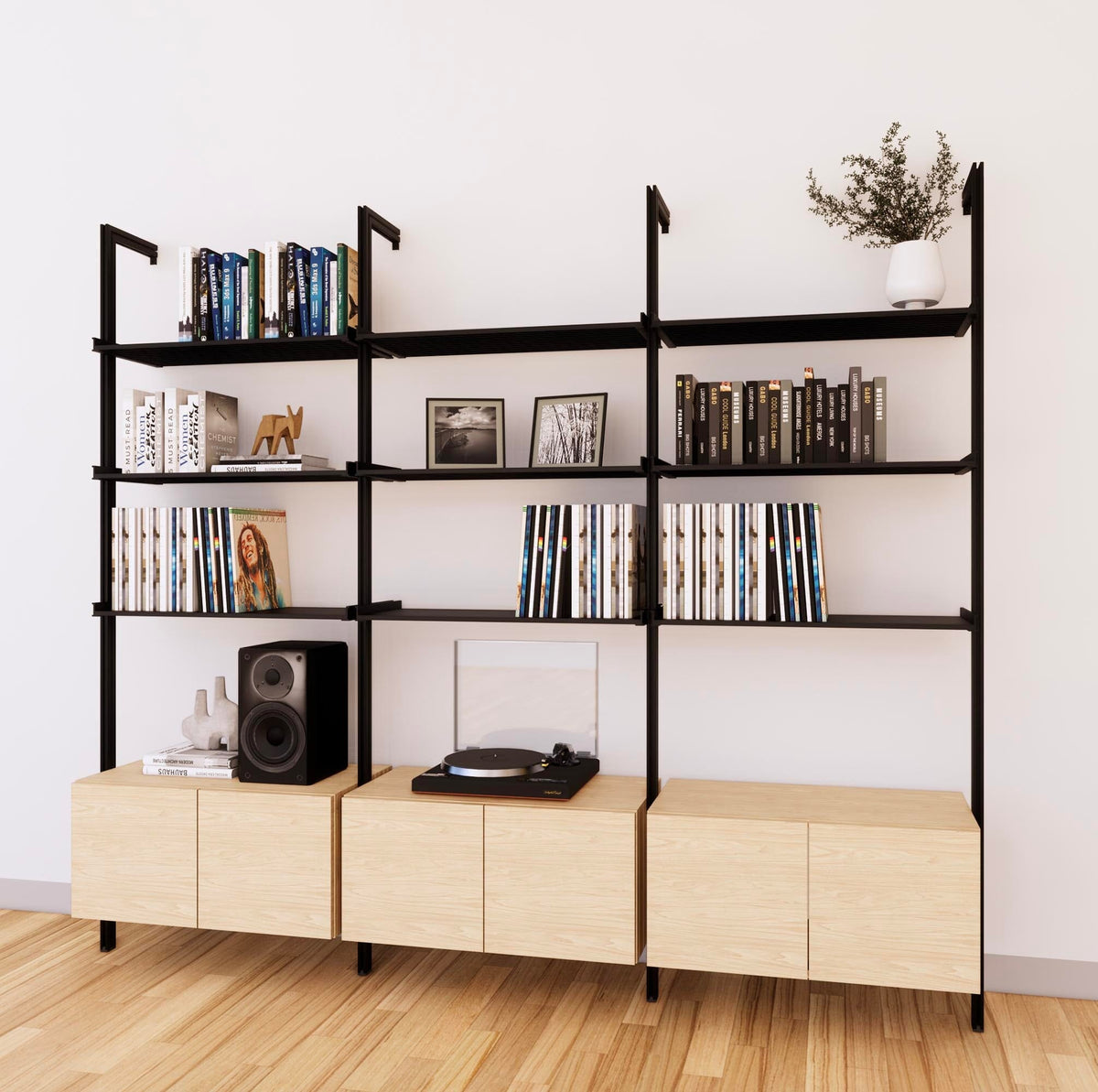 LP vinyl media storage shelving unit with Casting Light shelves and black vertical posts, three bays, shown with open record storage shelf levels.