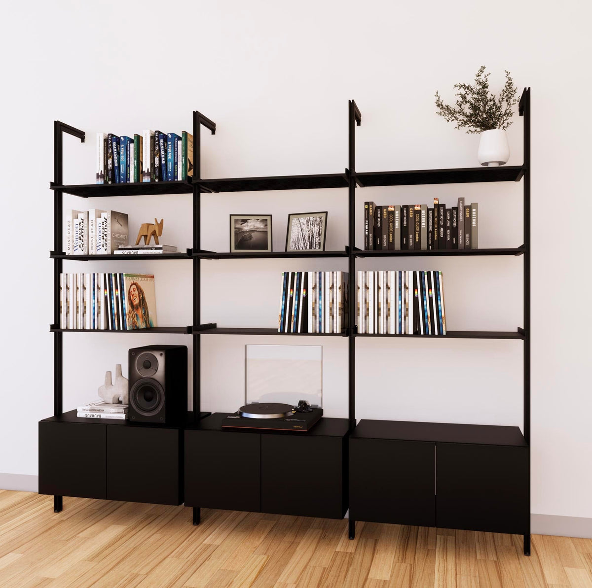 LP vinyl media storage shelving unit with black shelves and black vertical posts, three bays, shown with open record storage shelf levels.