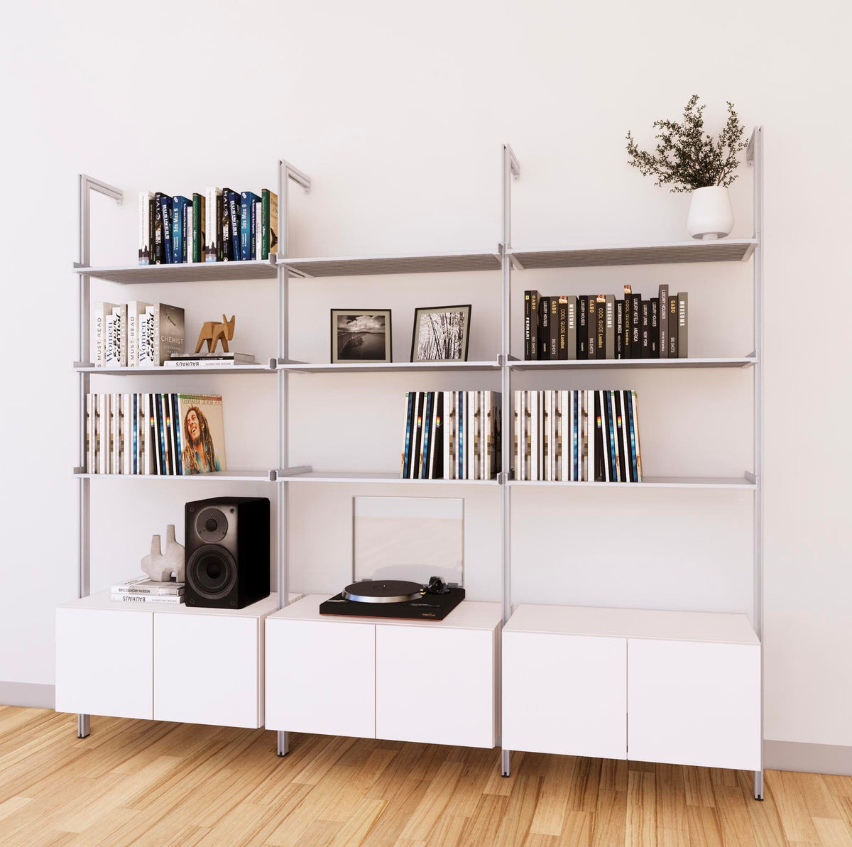 LP vinyl media storage shelving unit with white shelves and satin vertical posts, three bays, shown with open record storage shelf levels.