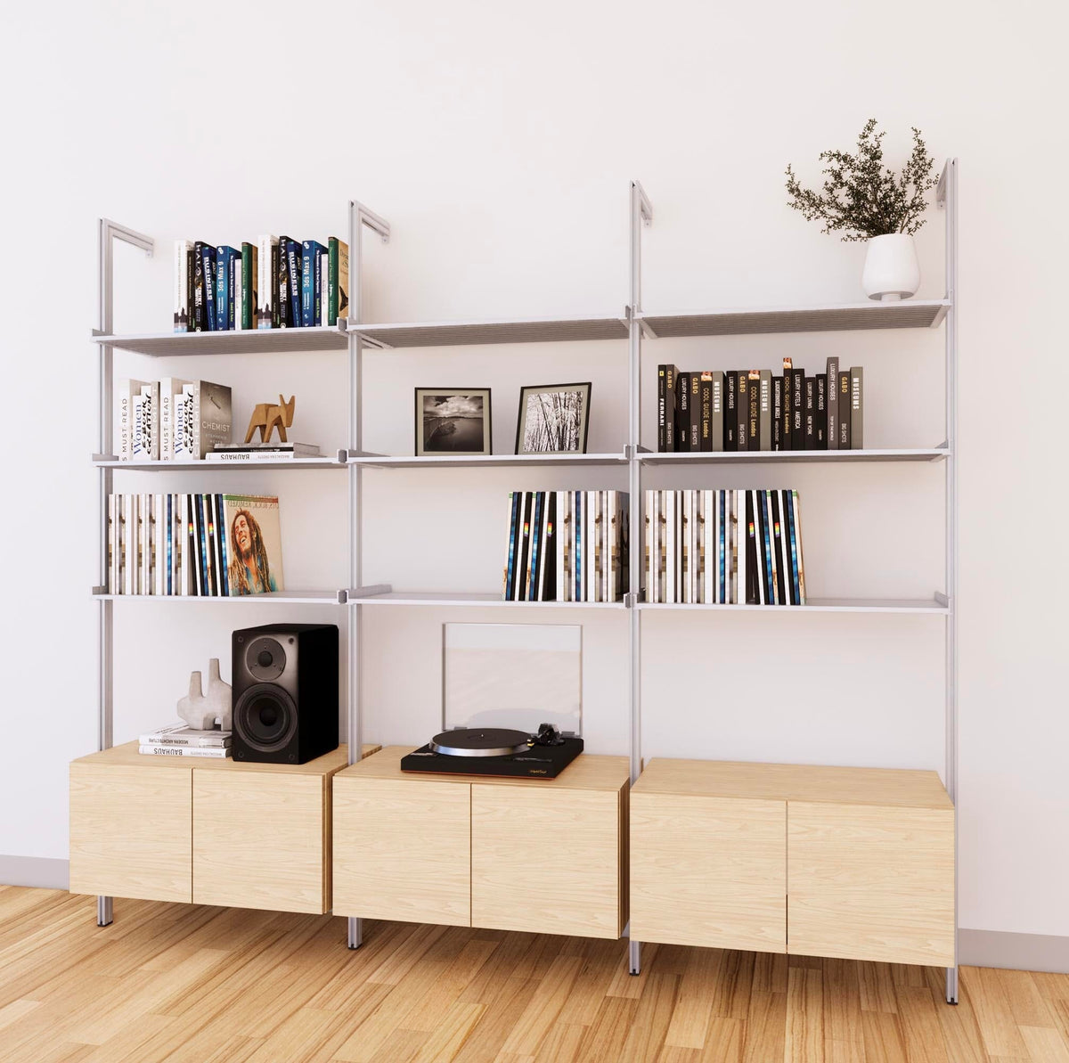 LP vinyl media storage shelving unit with Casting Light shelves and satin vertical posts, with Tea for Two wood cabinet storage, three bays, shown with open record storage shelf levels.