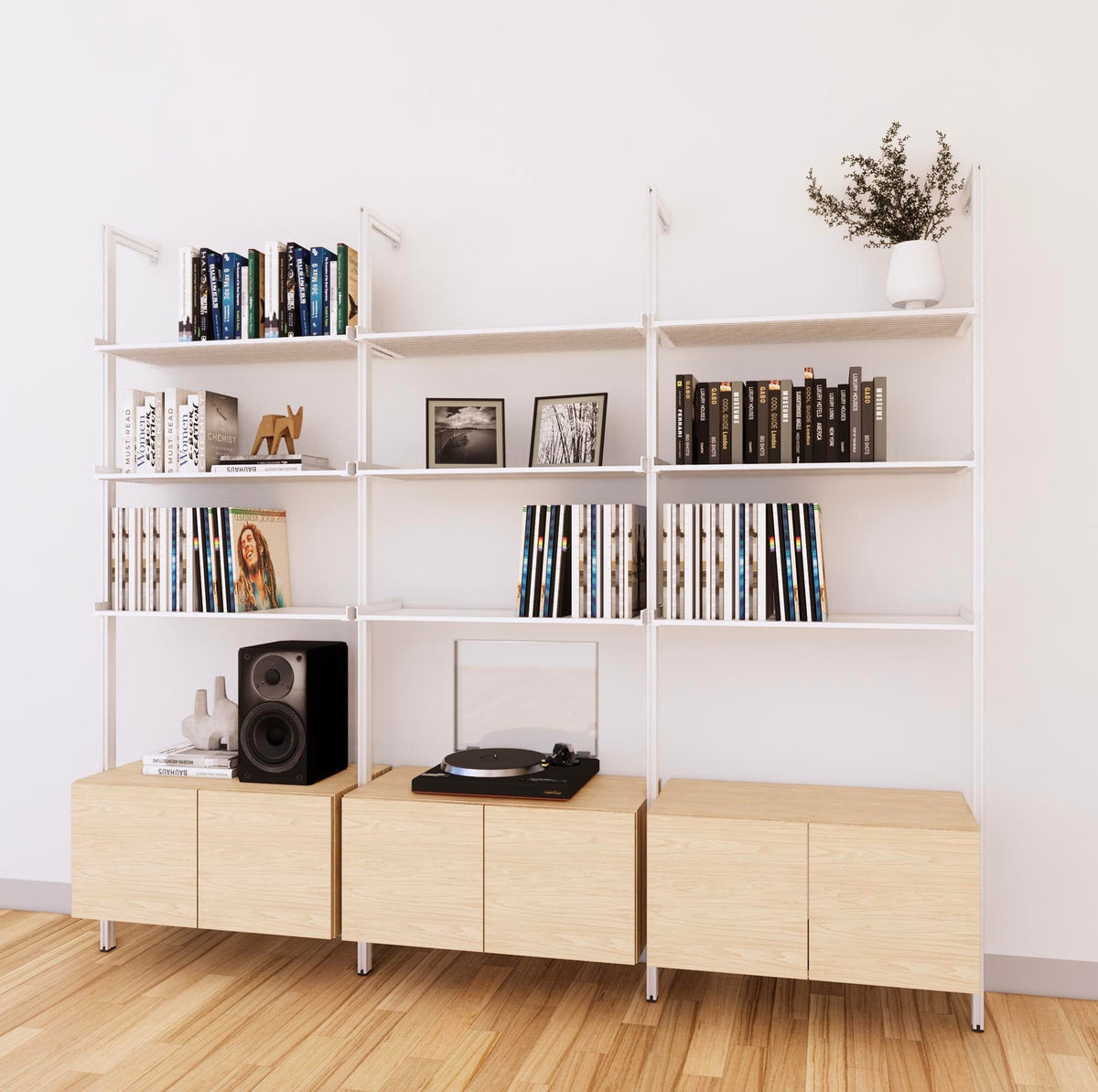 LP vinyl media storage shelving unit with Casting Light shelves and white vertical posts, three bays, shown with open record storage shelf levels.