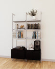 LP vinyl media storage shelving unit with black shelves and satin vertical posts, two bays, shown with open record storage shelf levels.