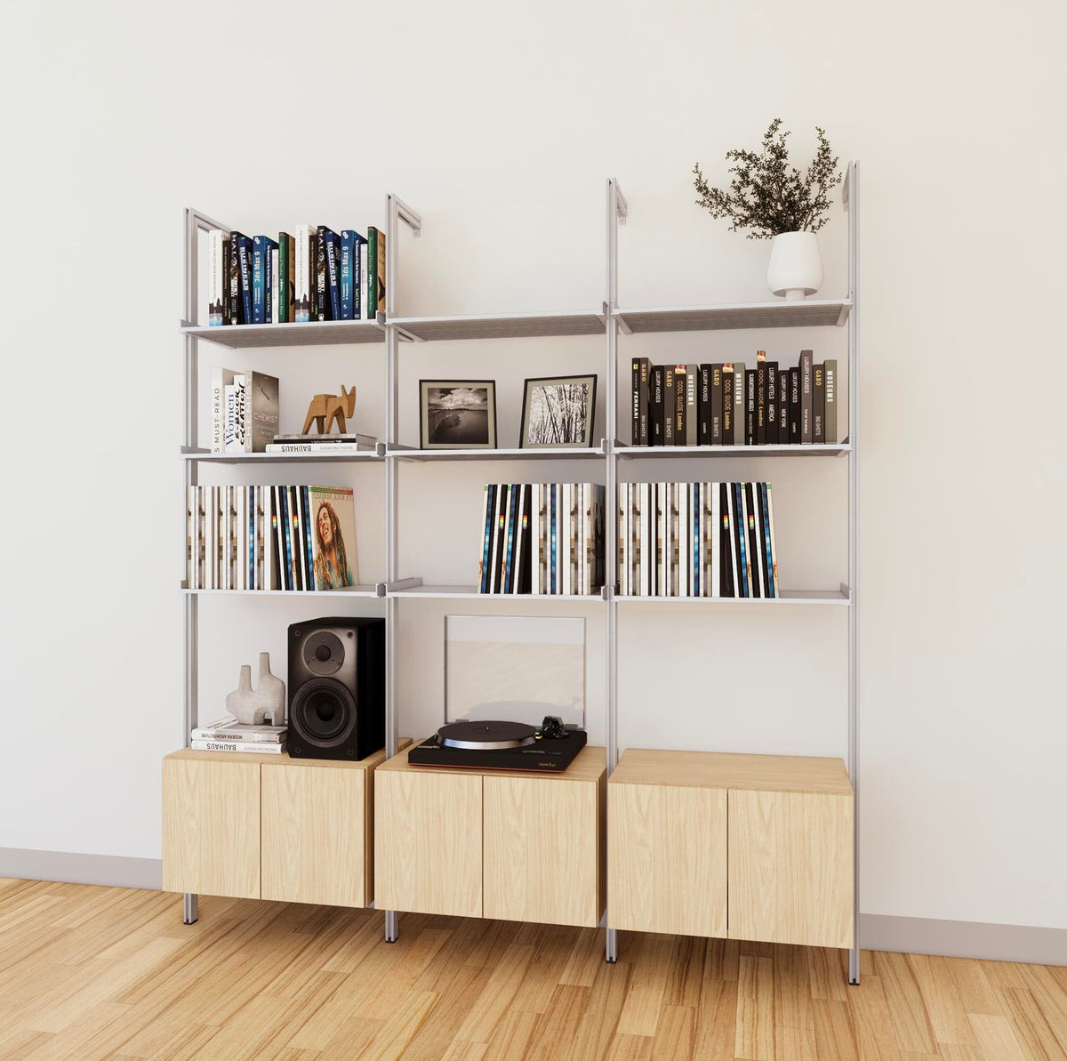 LP vinyl media storage shelving unit with Casting Light shelves and satin vertical posts, three bays, shown with open record storage shelf levels.