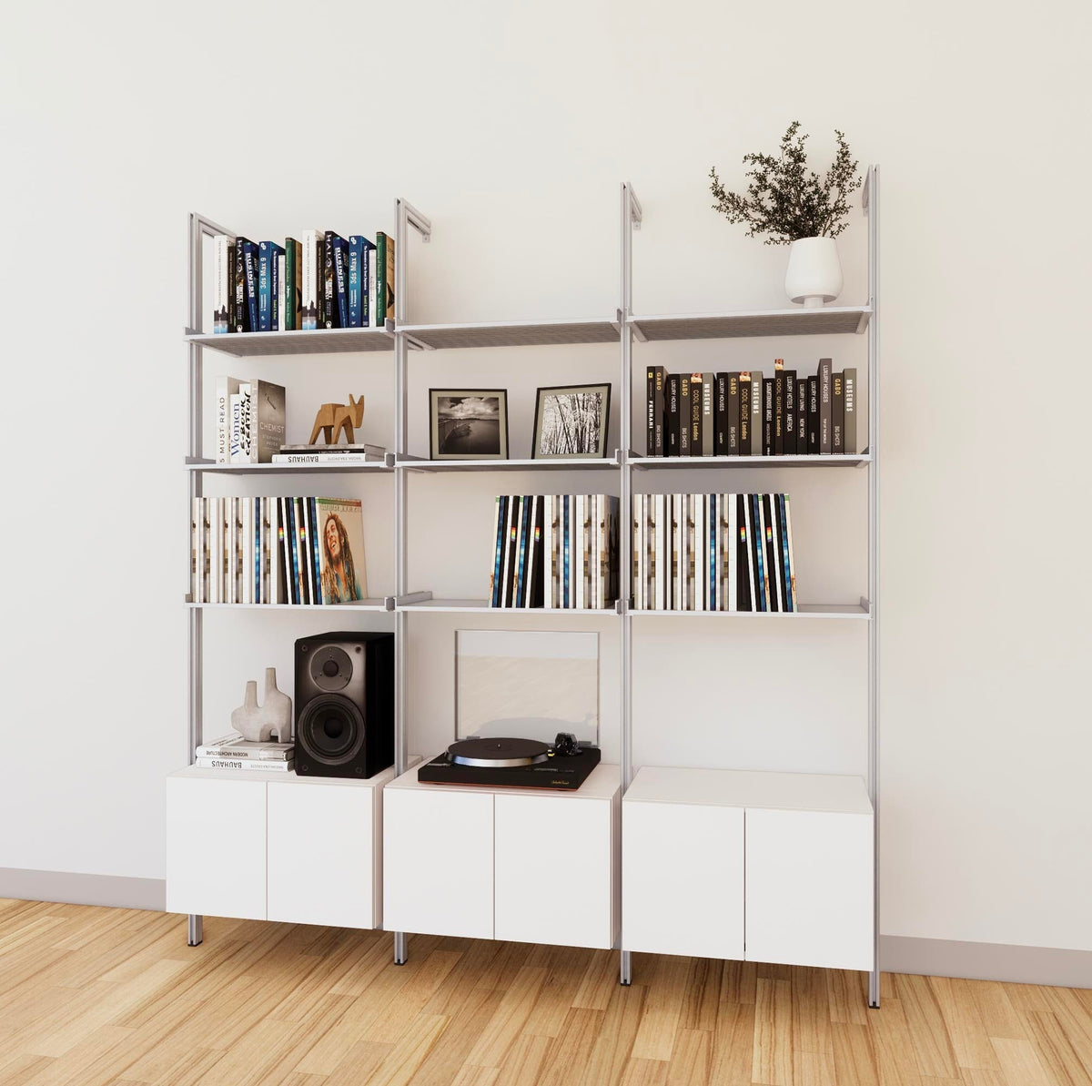 LP vinyl media storage shelving unit with white shelves and satin vertical posts, three bays, shown with open record storage shelf levels.