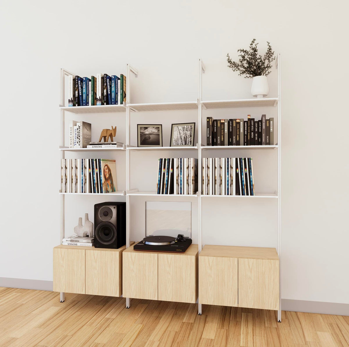LP vinyl media storage shelving unit with Casting Light shelves and white vertical posts, three bays, shown with open record storage shelf levels.