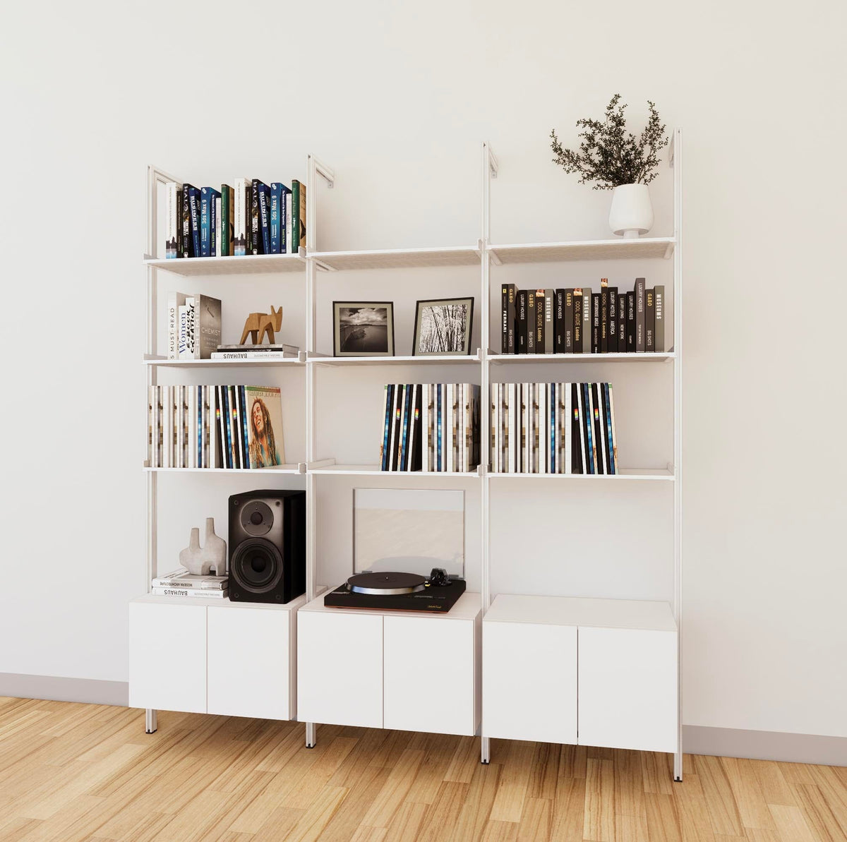 LP vinyl media storage shelving unit with white shelves and white vertical posts, three bays, shown with open record storage shelf levels.
