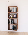 Modular vinyl storage shelving unit with wood-look shelves and satin vertical posts, shown with open record storage shelf levels.