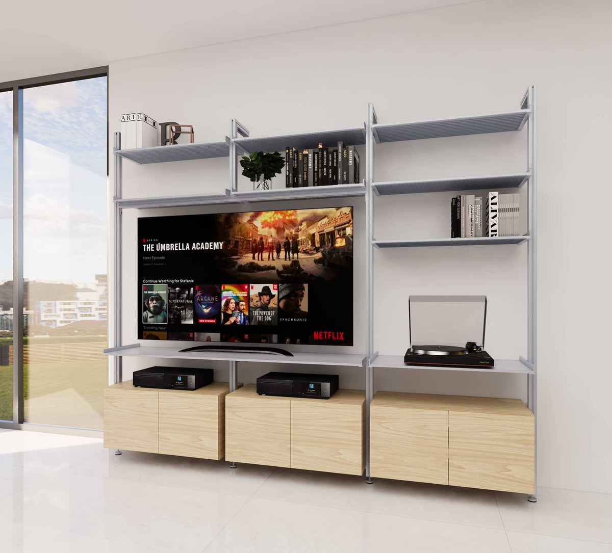Modular shelving unit with satin and Casting Light shelves and satin vertical posts.
